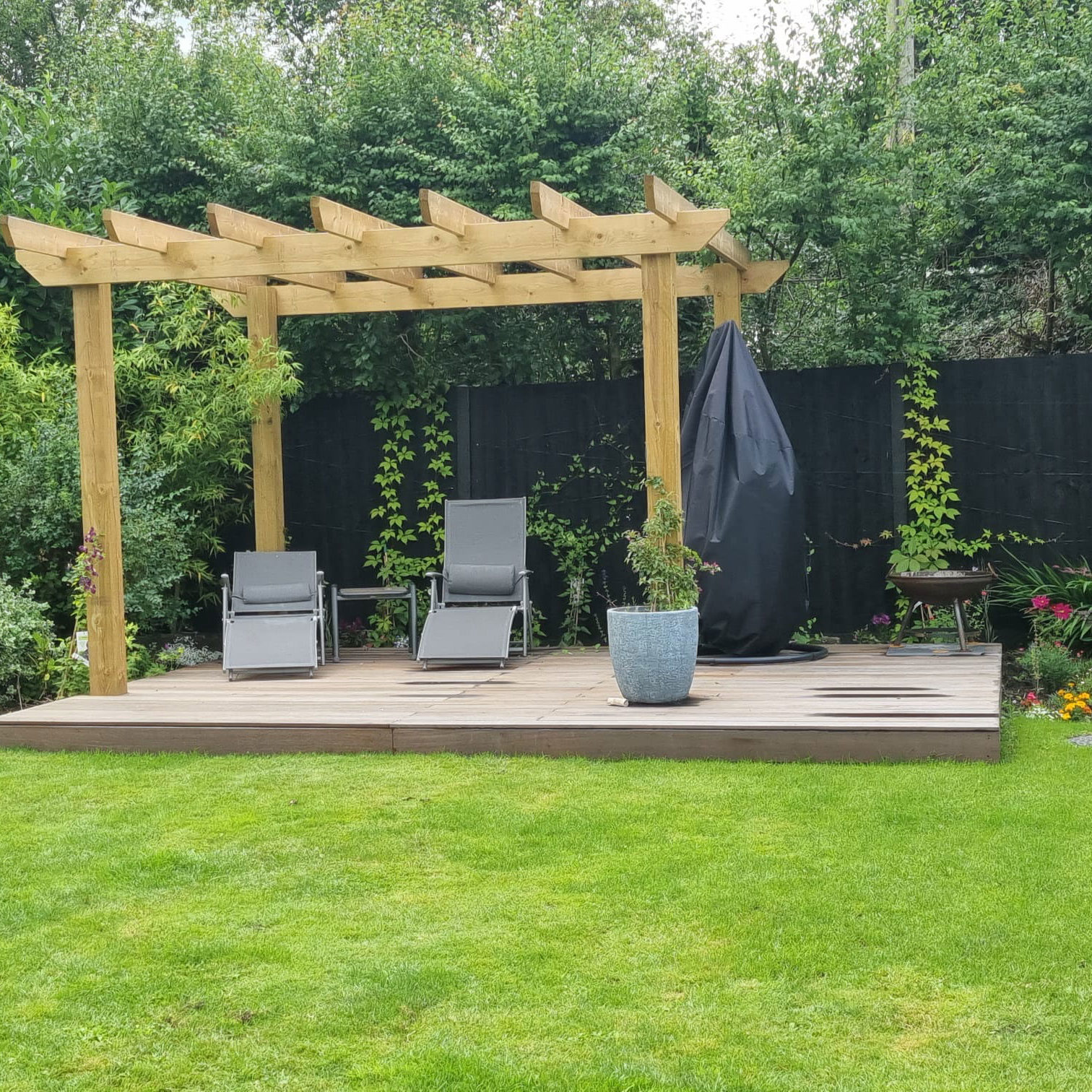 timber pergola and seating area in new garden